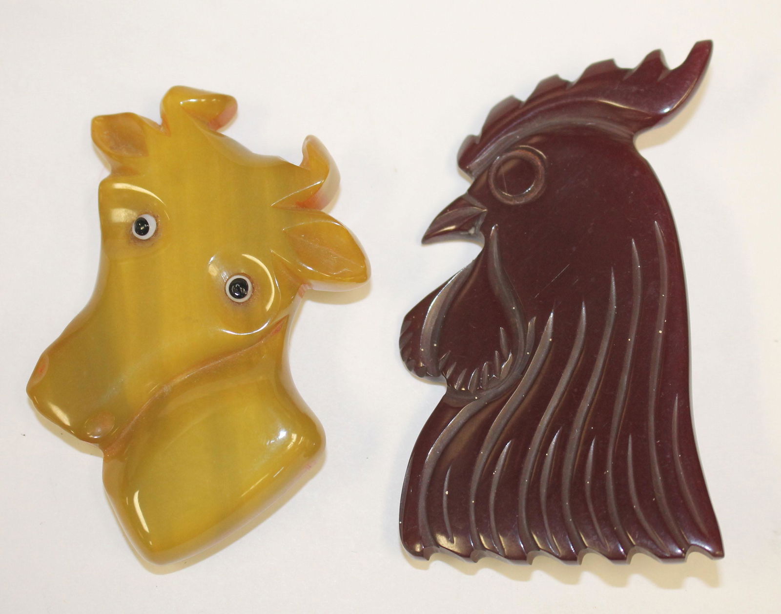 2 Vintage Bakelite carved pins incl green marble cow & (1 of 4)