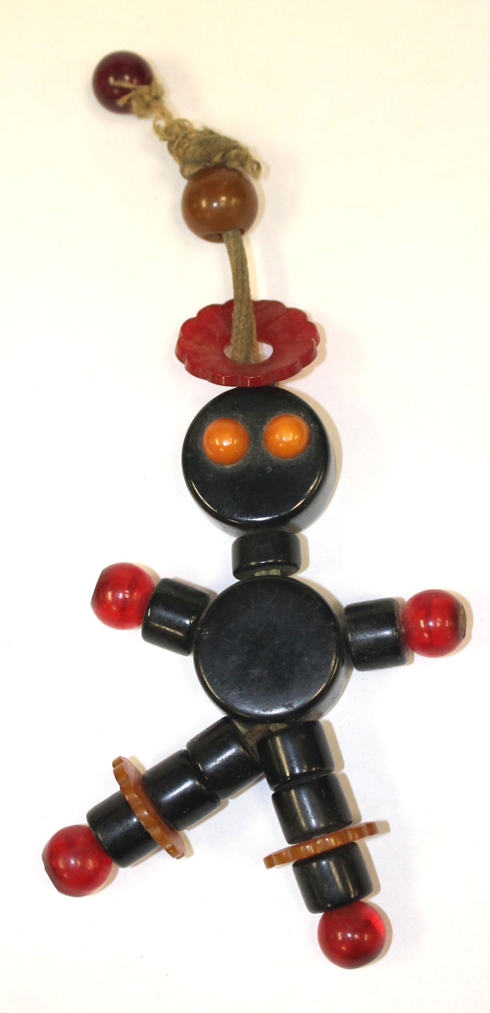 Vintage Bakelite ebony w red & butterscotch accents (1 of 2)