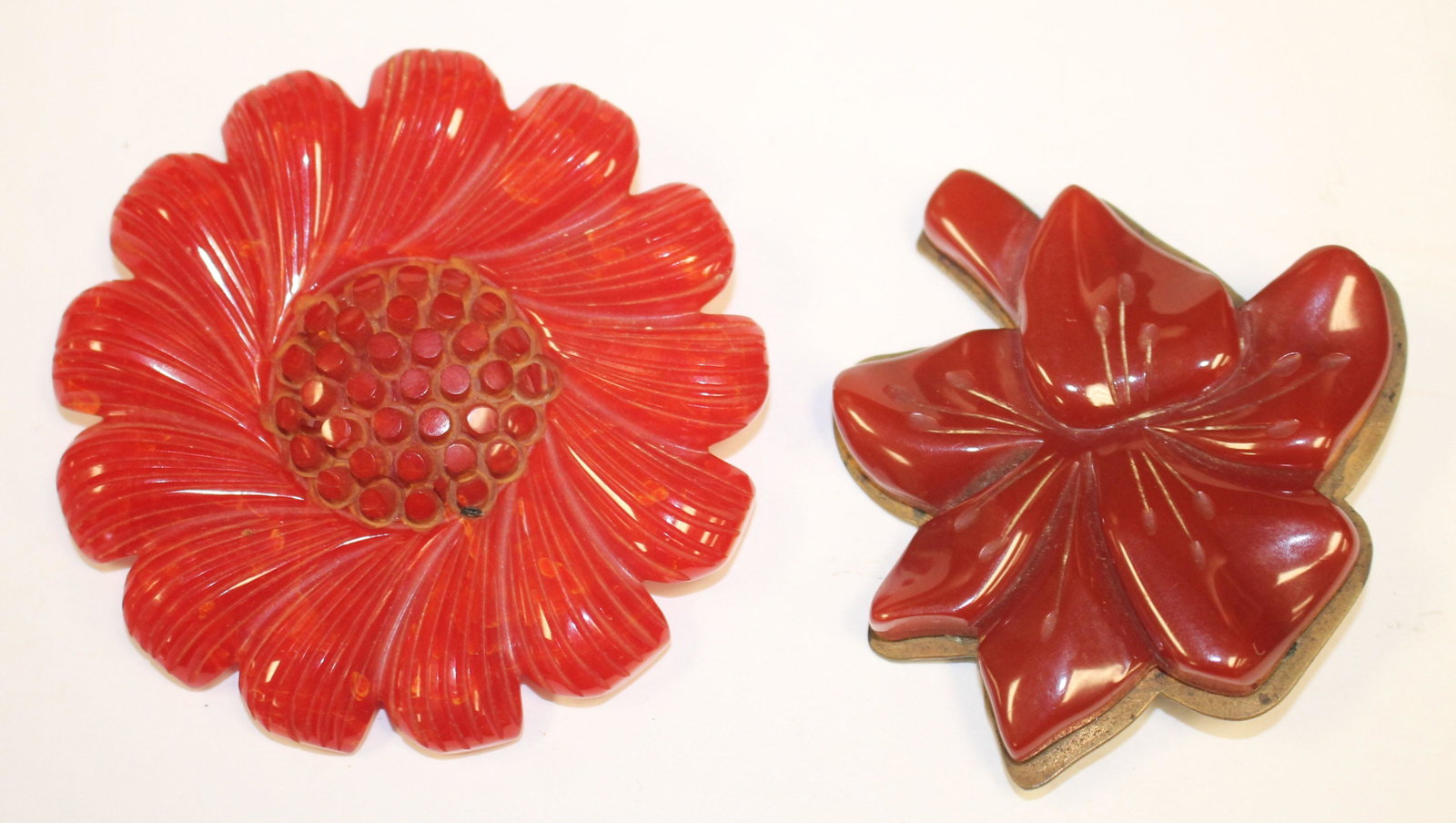2 Vintage Bakelite red carved floral pins incl 1 brass: 2 Vintage Bakelite red carved floral pins incl 1 brass backed - 3" & 2 3/4"