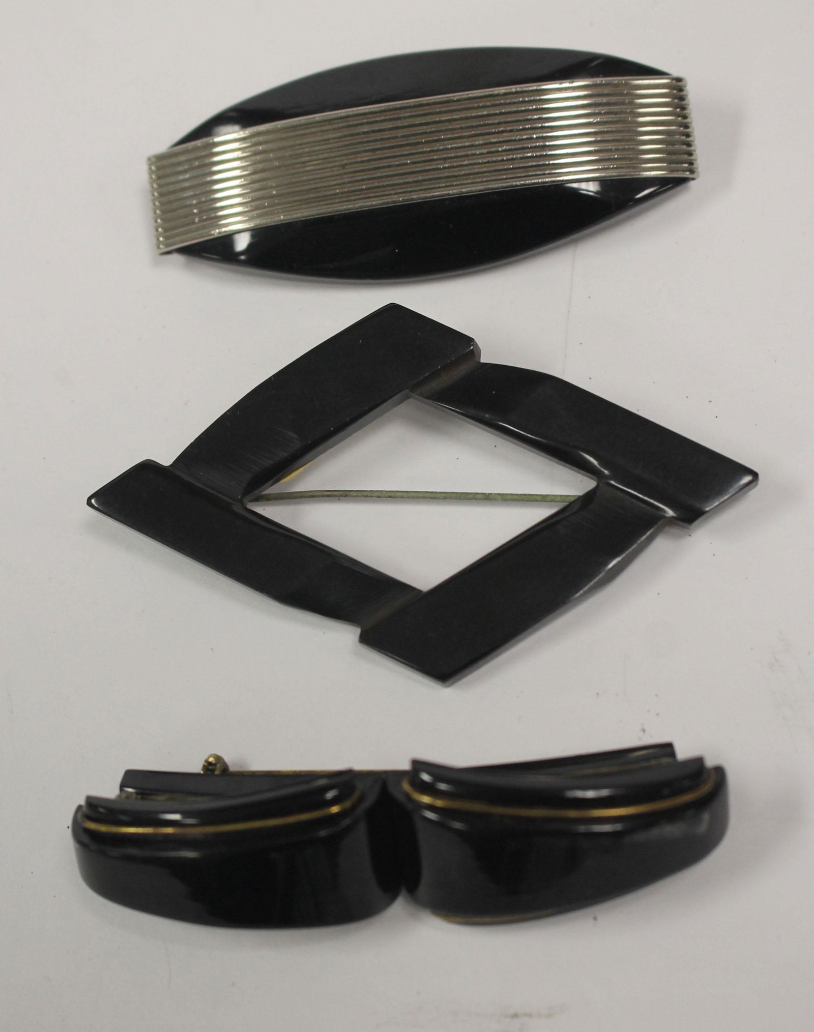 lot of 3 Vintage Bakelite ebony pins incl 1 w silver: lot of 3 Vintage Bakelite ebony pins incl 1 w silver applied dec & 1 w gold applied dec - 3 1/4" - 3 1/2"