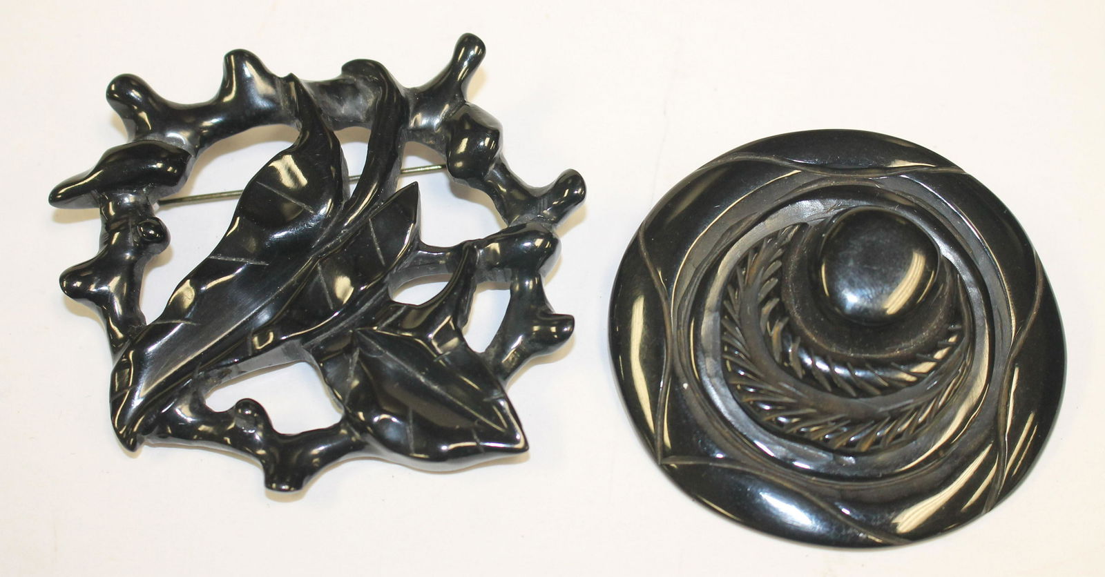 lot of 2 Vintage Bakelite carved ebony pins - 2 1/2" & (1 of 5)