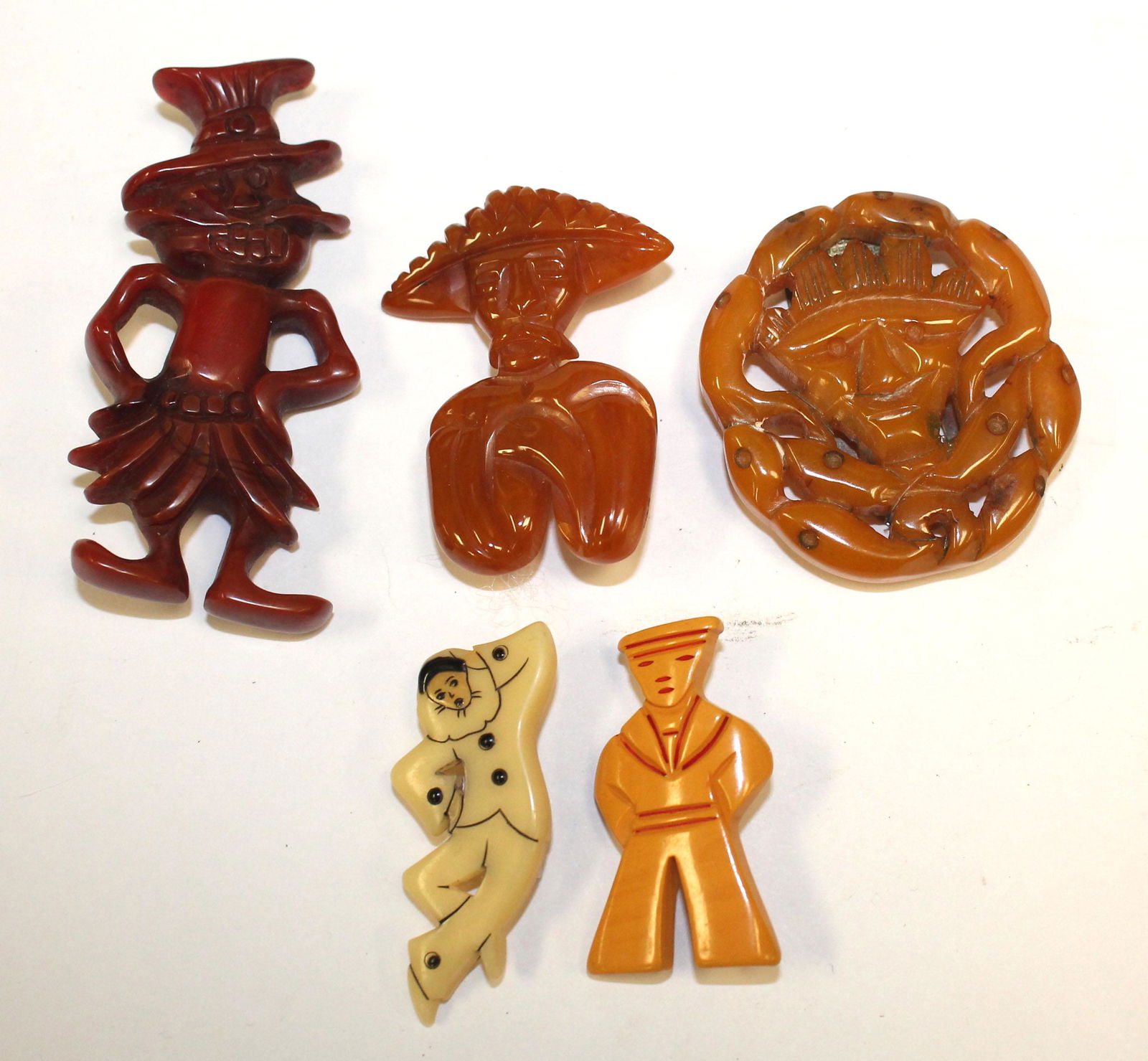 lot of 5 Vintage Bakelite figural pins & clips - (1 of 5)