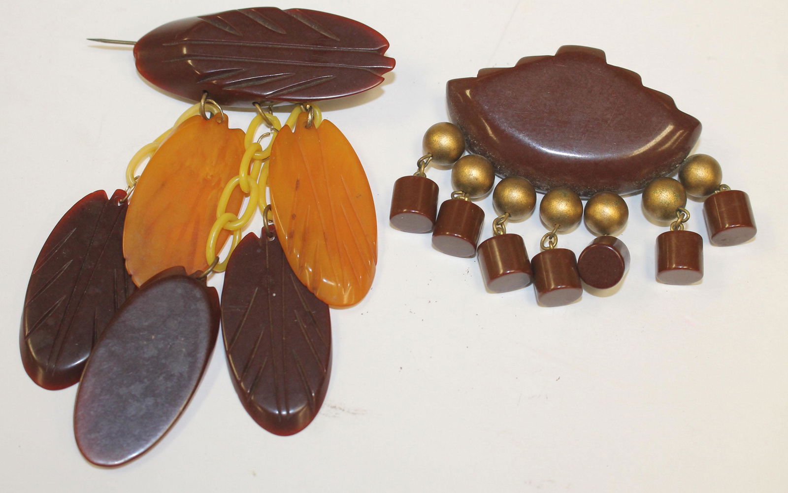 lot of 2 Vintage Bakelite brown dangle pins - 4 1/4" & (1 of 2)