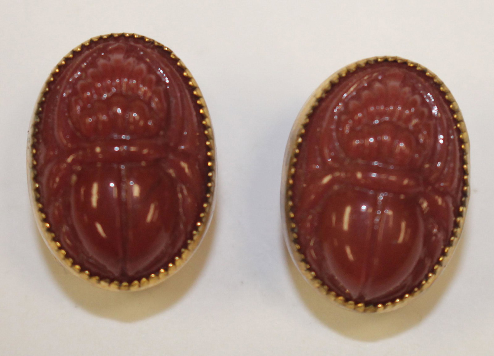 pr of carved carnelian clip earrings: pr of carved carnelian clip earrings