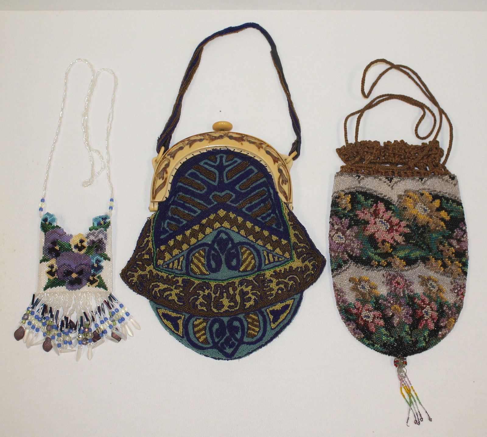 lot of 3 vintage beaded purses incl 1 w beautiful bone: lot of 3 vintage beaded purses incl 1 w beautiful bone handle plus a small hand beaded pouch by Lianne Mann - approx 3", 5" & 5 1/2" wide