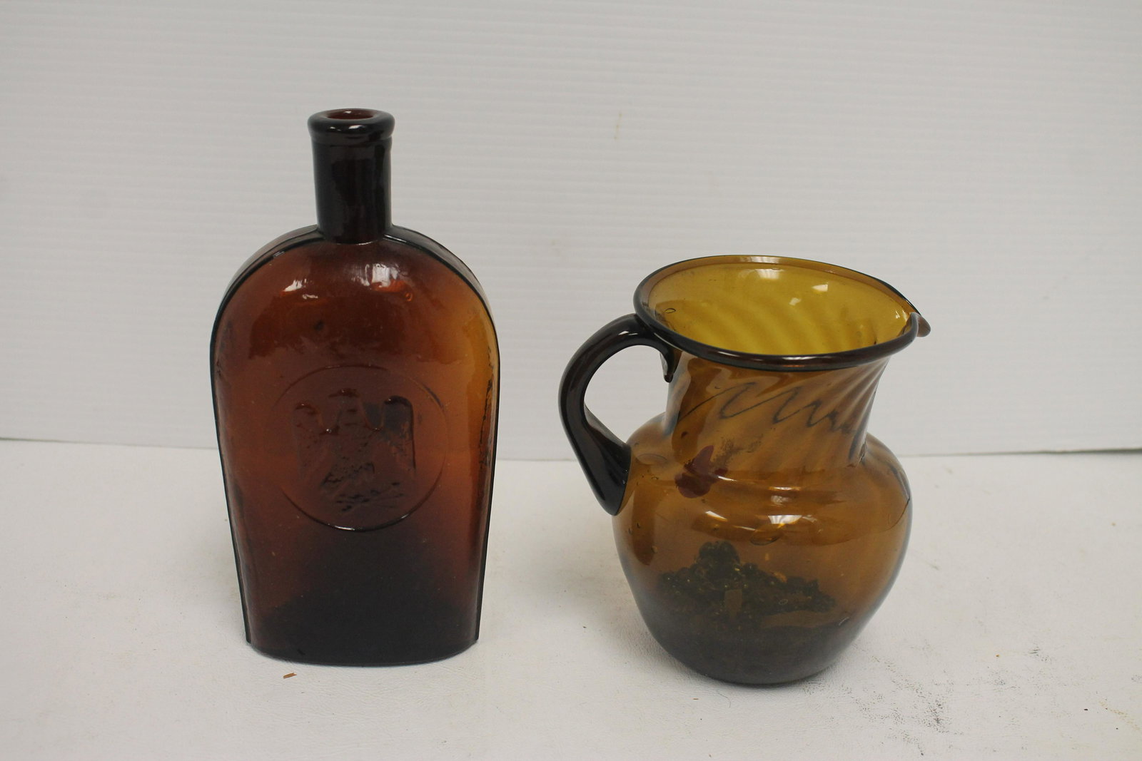 Free blown amber pitcher & amber eagle flask - 5 1/2": Free blown amber pitcher & amber eagle flask - 5 1/2" tall & 7 1/2" tall