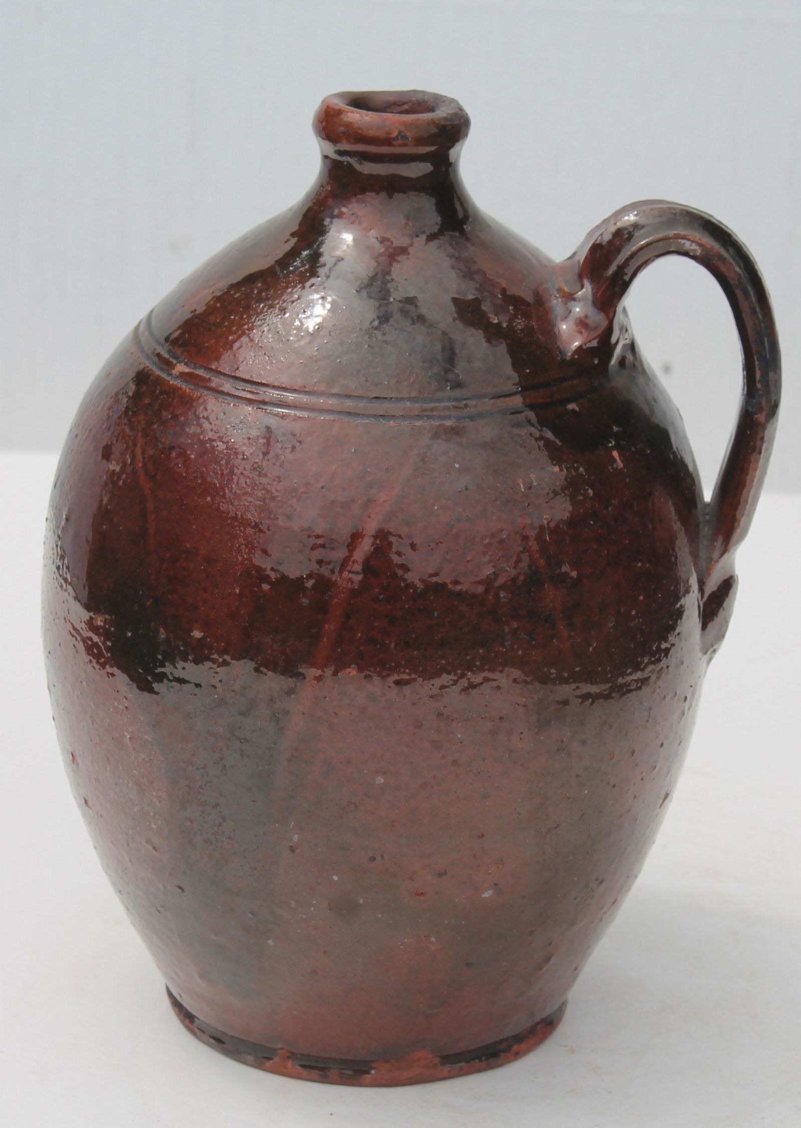 Antique redware jug w incised rings - 8 3/4" tall: Antique redware jug w incised rings - 8 3/4" tall
