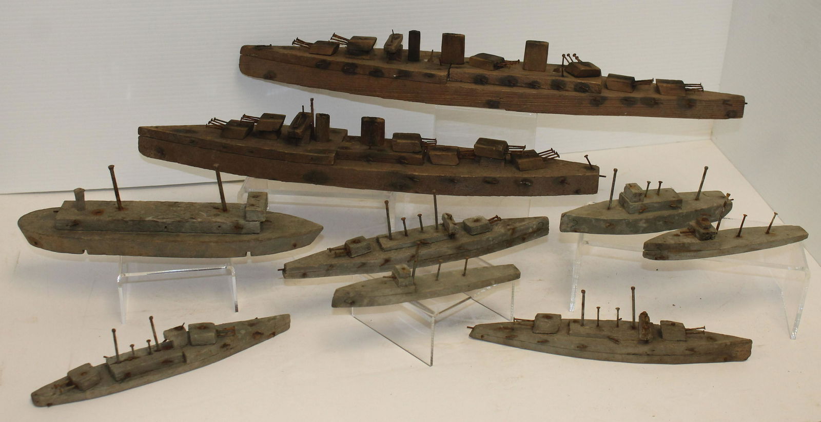 lot of 9 wooden carved ships w nail accents - 6 1/2": lot of 9 wooden carved ships w nail accents - 6 1/2" long - 20 1/2" long