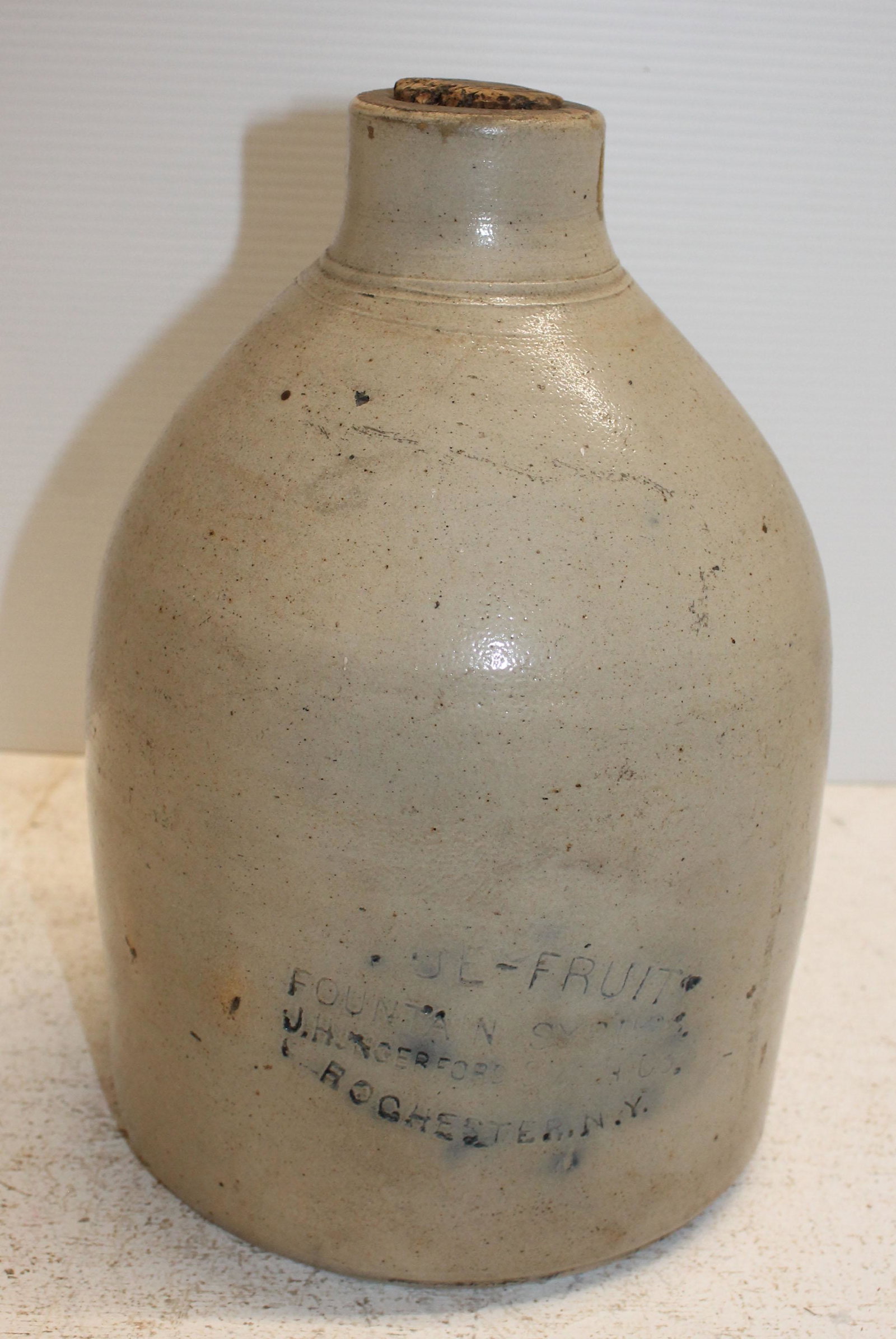 19thC merchant stoneware jug "Fountain Syrup…: 19thC merchant stoneware jug "Fountain Syrup… Rochester, NY" - 11" tall