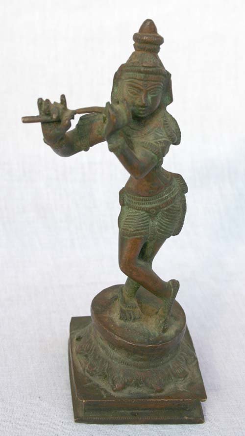 6" tall bronze figure of Middle Eastern floutist