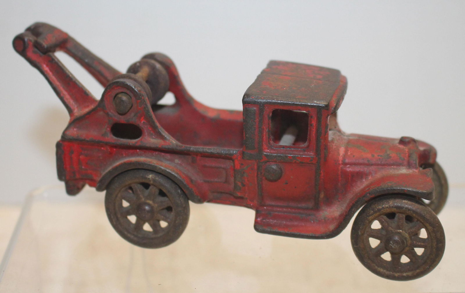 ca 1930's cast iron Arcade tow truck in orig red paint: ca 1930's cast iron Arcade tow truck in orig red paint - 5 1/2" long