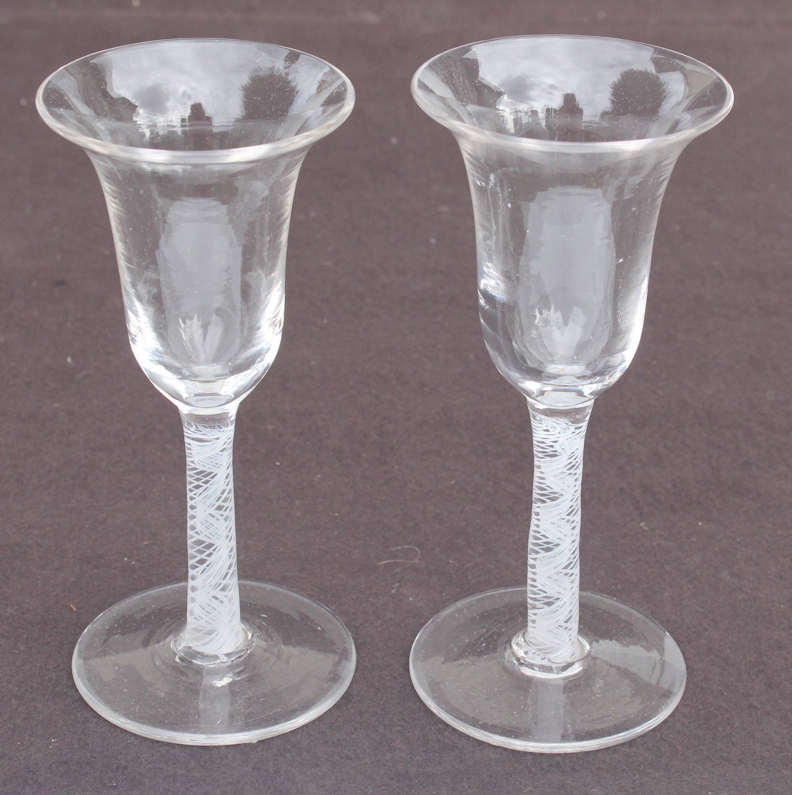 pr of antique English wine glasses w interior swirl: pr of antique English wine glasses w interior swirl stemsapprox 5 3/4" tall