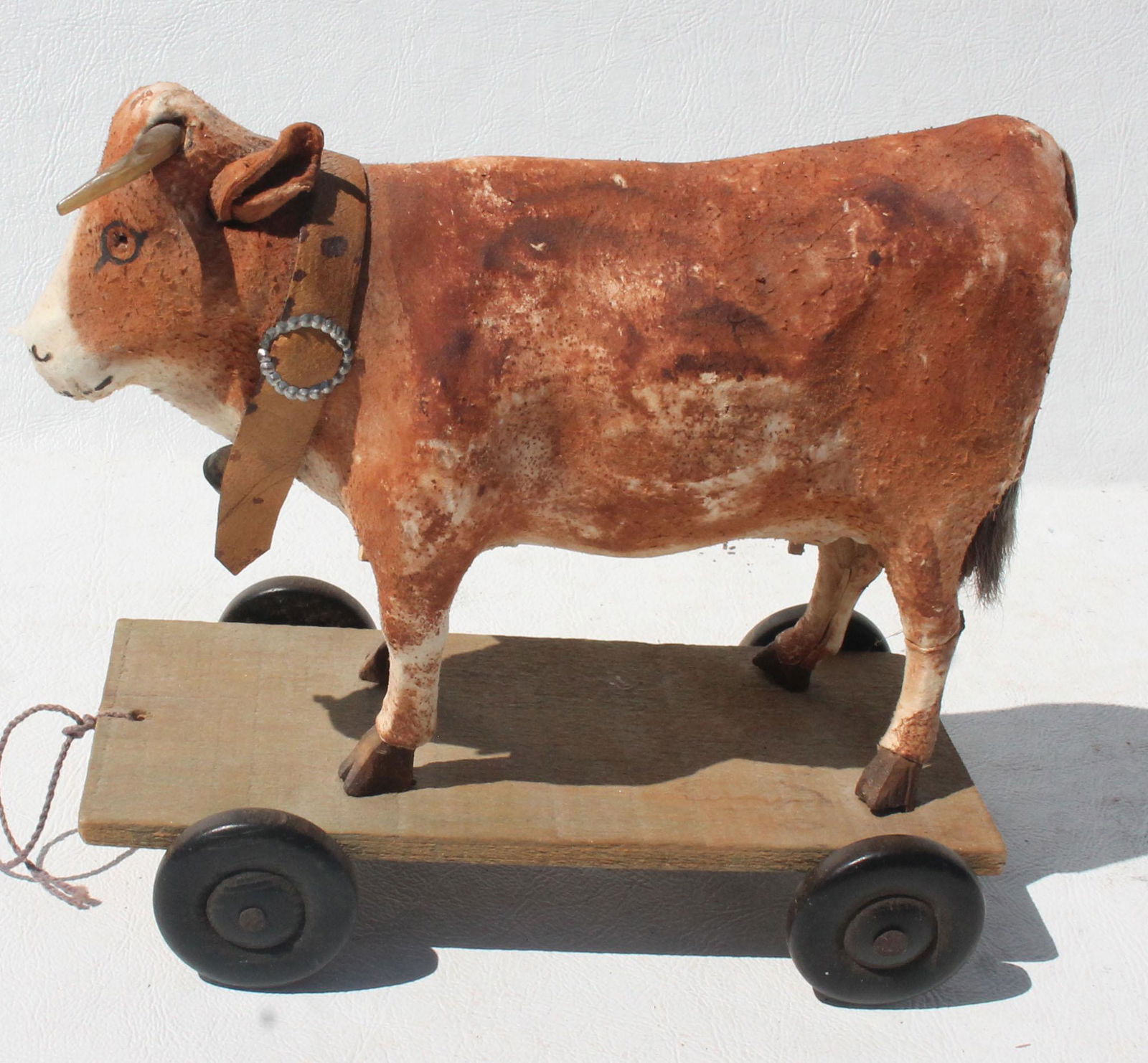 Sweet felt covered cow pull toy (wheels unattached) -: Sweet felt covered cow pull toy (wheels unattached) - as isapprox 6 1/2" long x 5" tall (incl wheels)