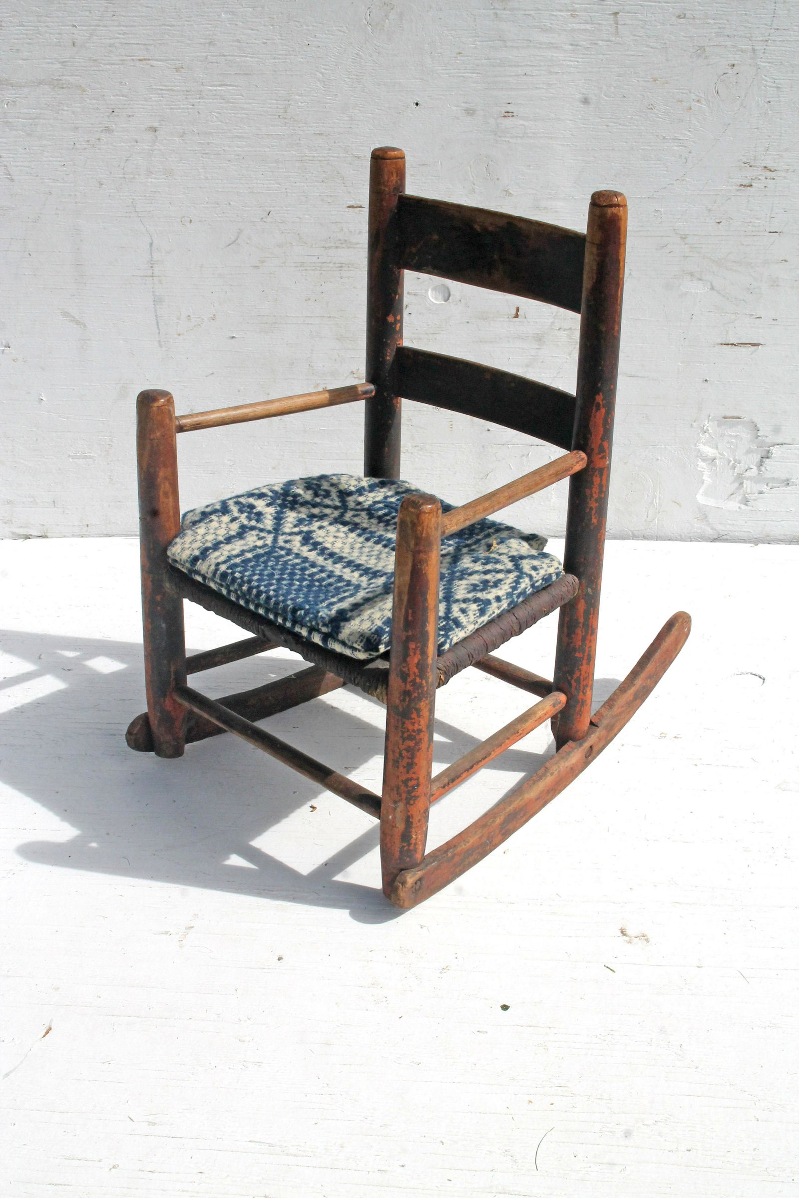 Antique child's size rocker in as found condition w: Antique child's size rocker in as found condition w homespun pillow