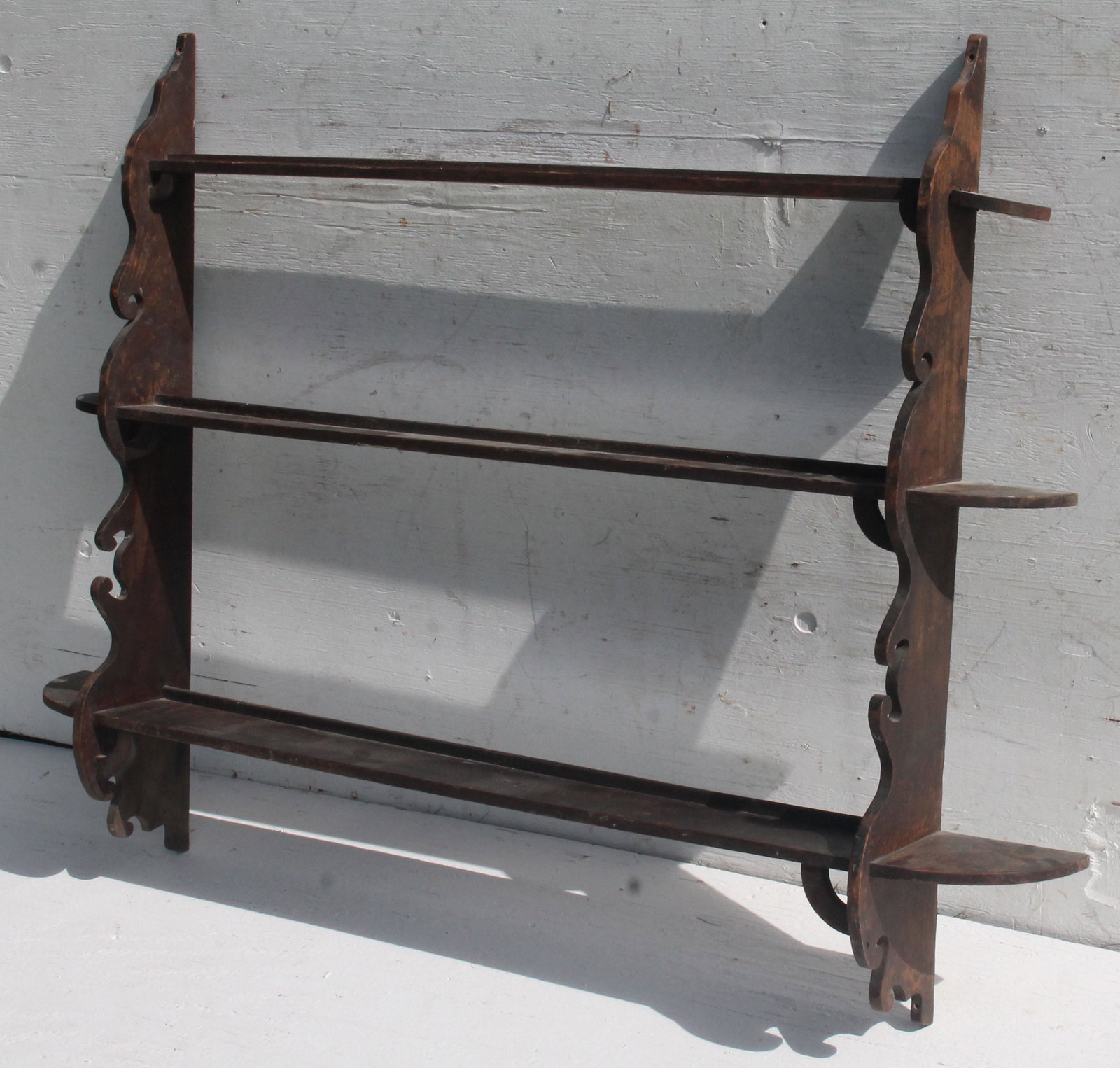 Antique 3 tiered hanging shelf w scalloped profile &: Antique 3 tiered hanging shelf w scalloped profile & plate rails - 40" tall x 48" at widest point x 7" at deepest point
