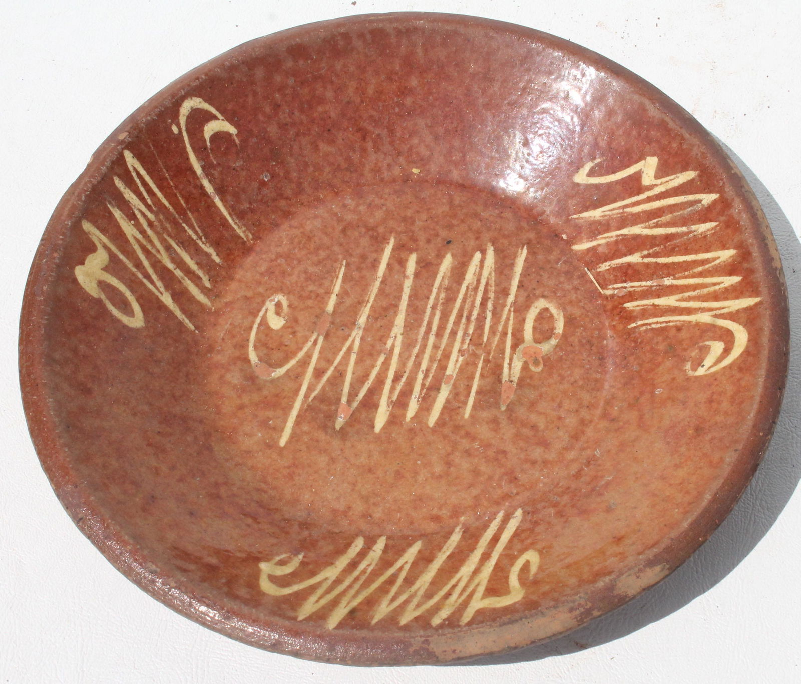 Antique redware plate with slip decoration as found -: Antique redware plate with slip decoration as found - with rim chips 9 1/2" diameter