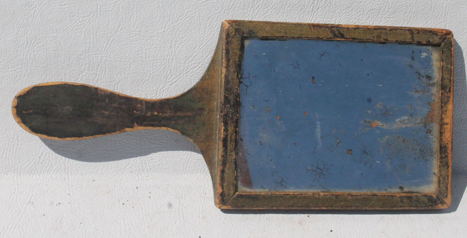 Small 19thC Shaker wooden hand mirror in orignal: Small 19thC Shaker wooden hand mirror in orignal surface - 8" long