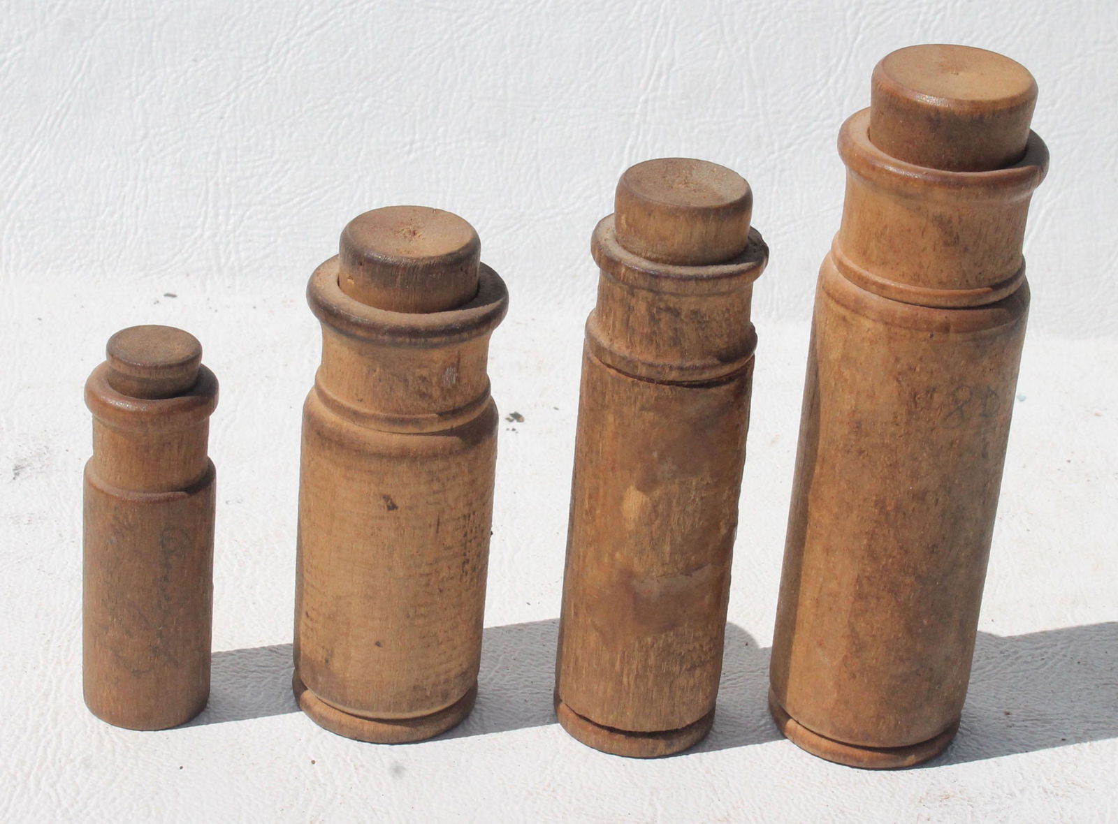 lot of 4 antique wooden needle cases - 3 1/2" - 2": lot of 4 antique wooden needle cases - 3 1/2" - 2"