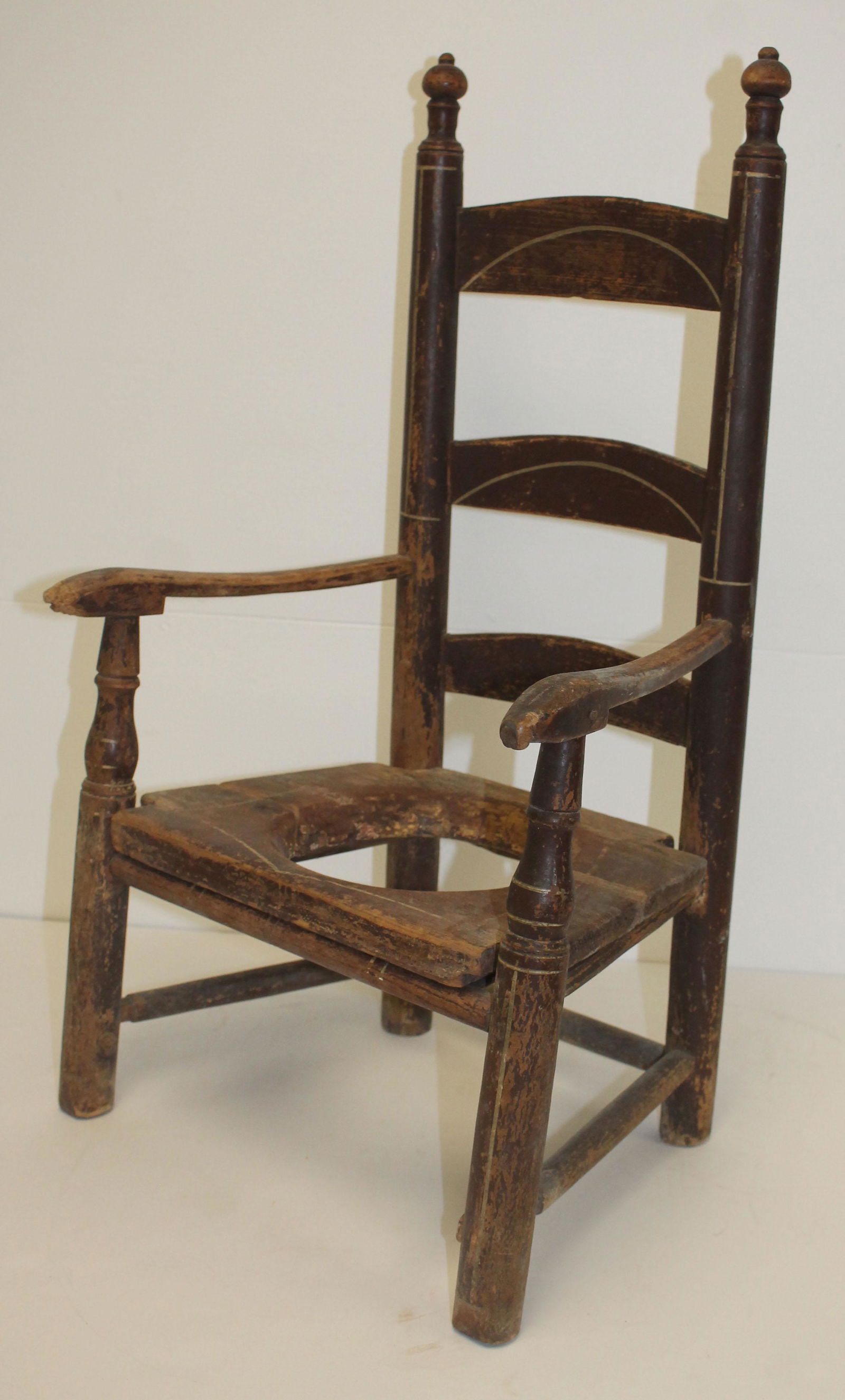 Antique child's ladderback potty chair in brown paint - (1 of 6)