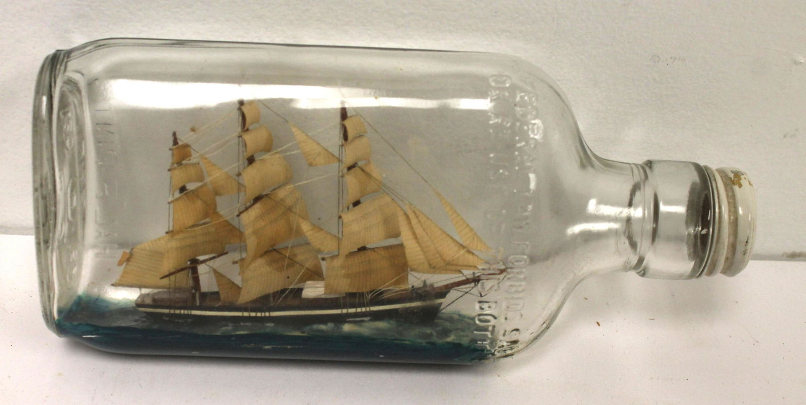 Ship model in flask form bottle - 6 3/4" long (1 of 3)
