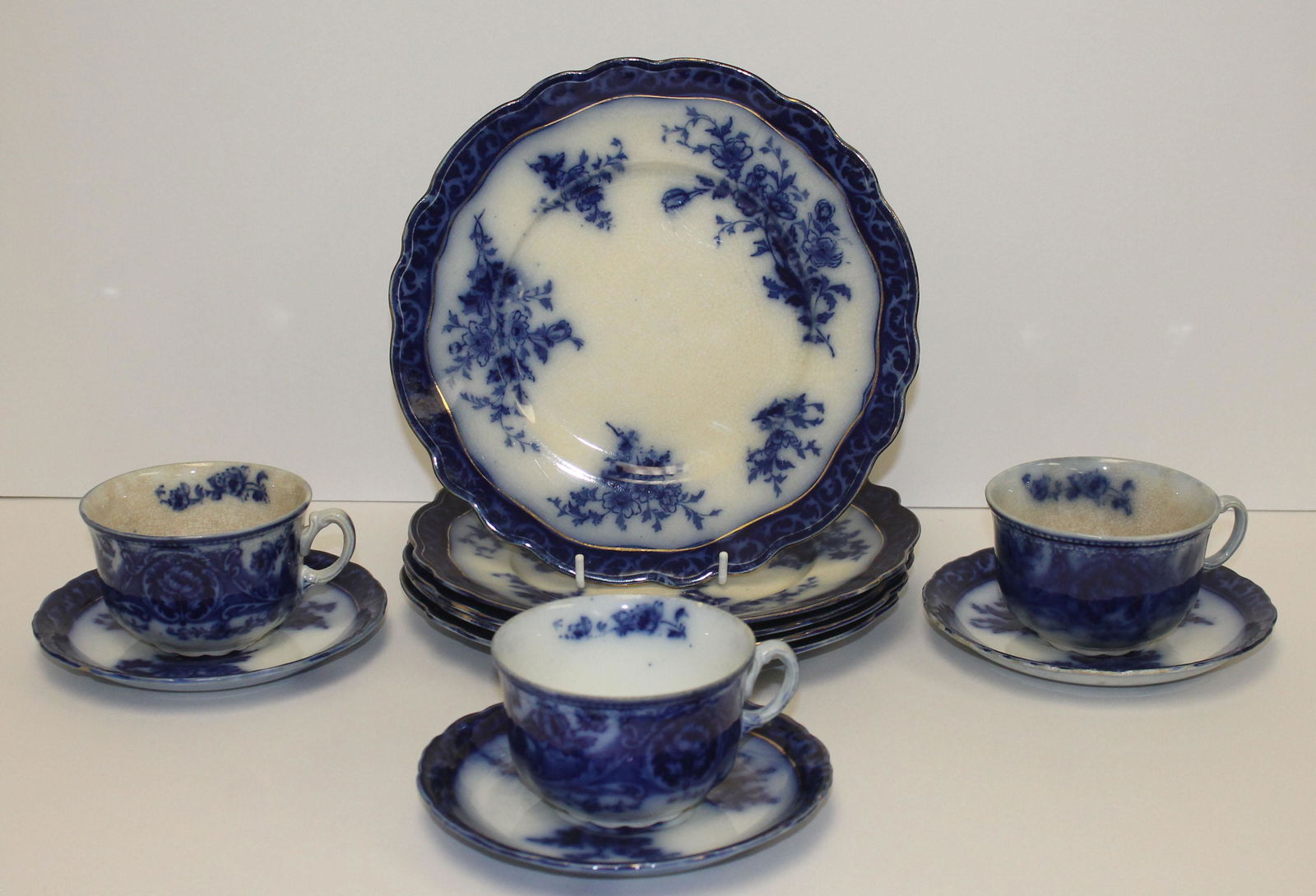 lot of 11 pieces of Flow Blue china in matching pattern (1 of 6)