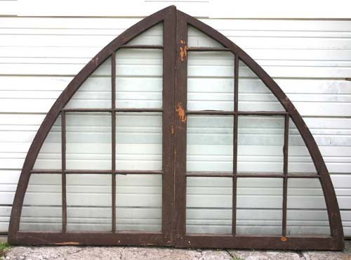 pr of antique architectural arch forming windows