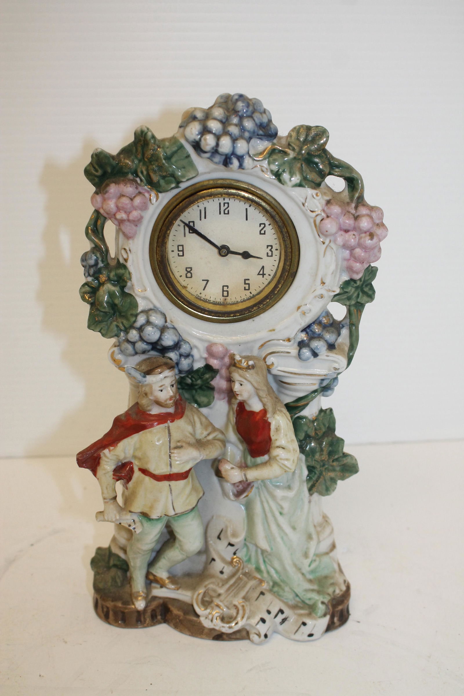 German porcelain clock w man & woman figural & grapes (1 of 5)