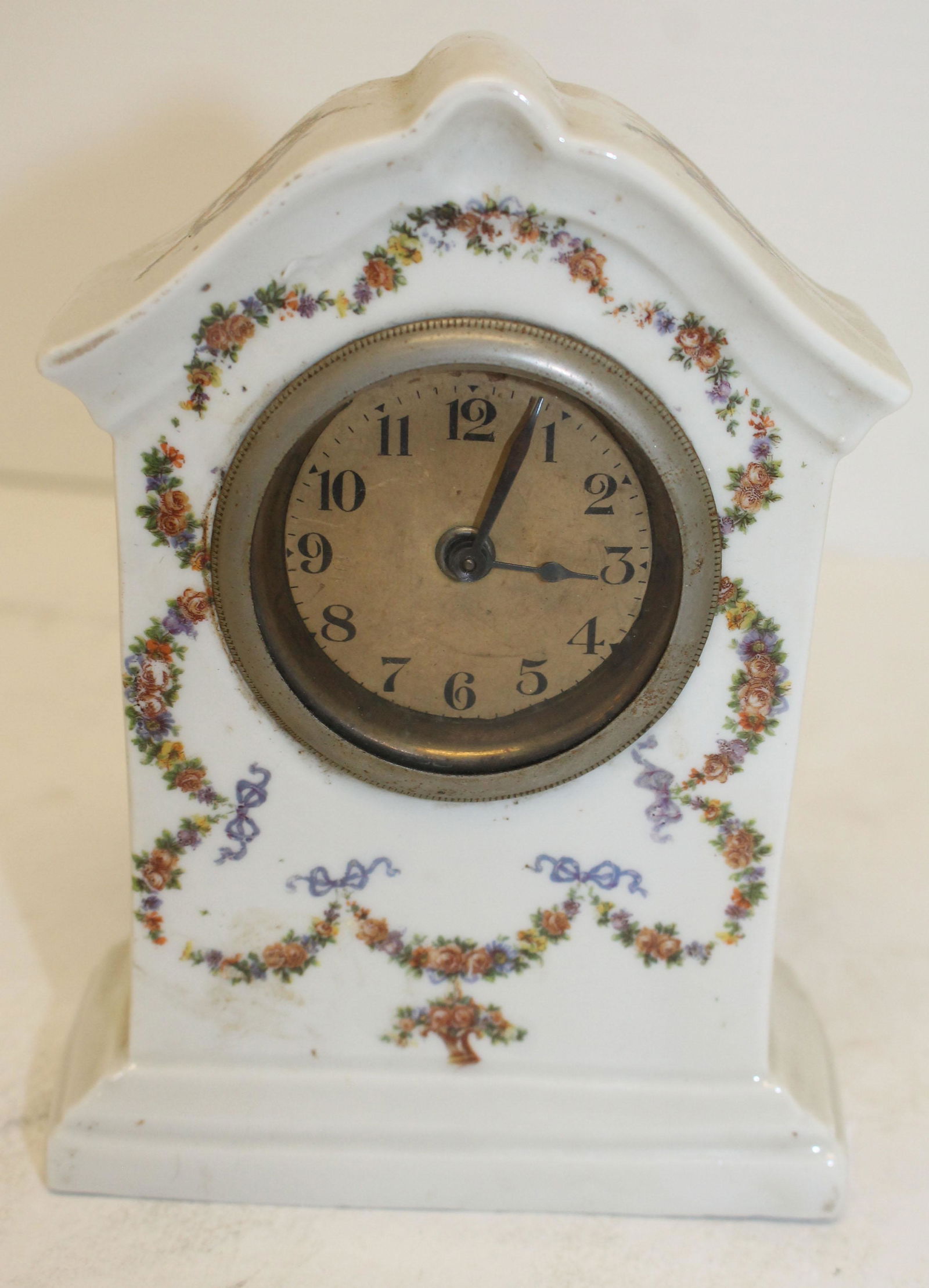 small porcelain clock - 5 3/4" tall x 4" wide (1 of 3)