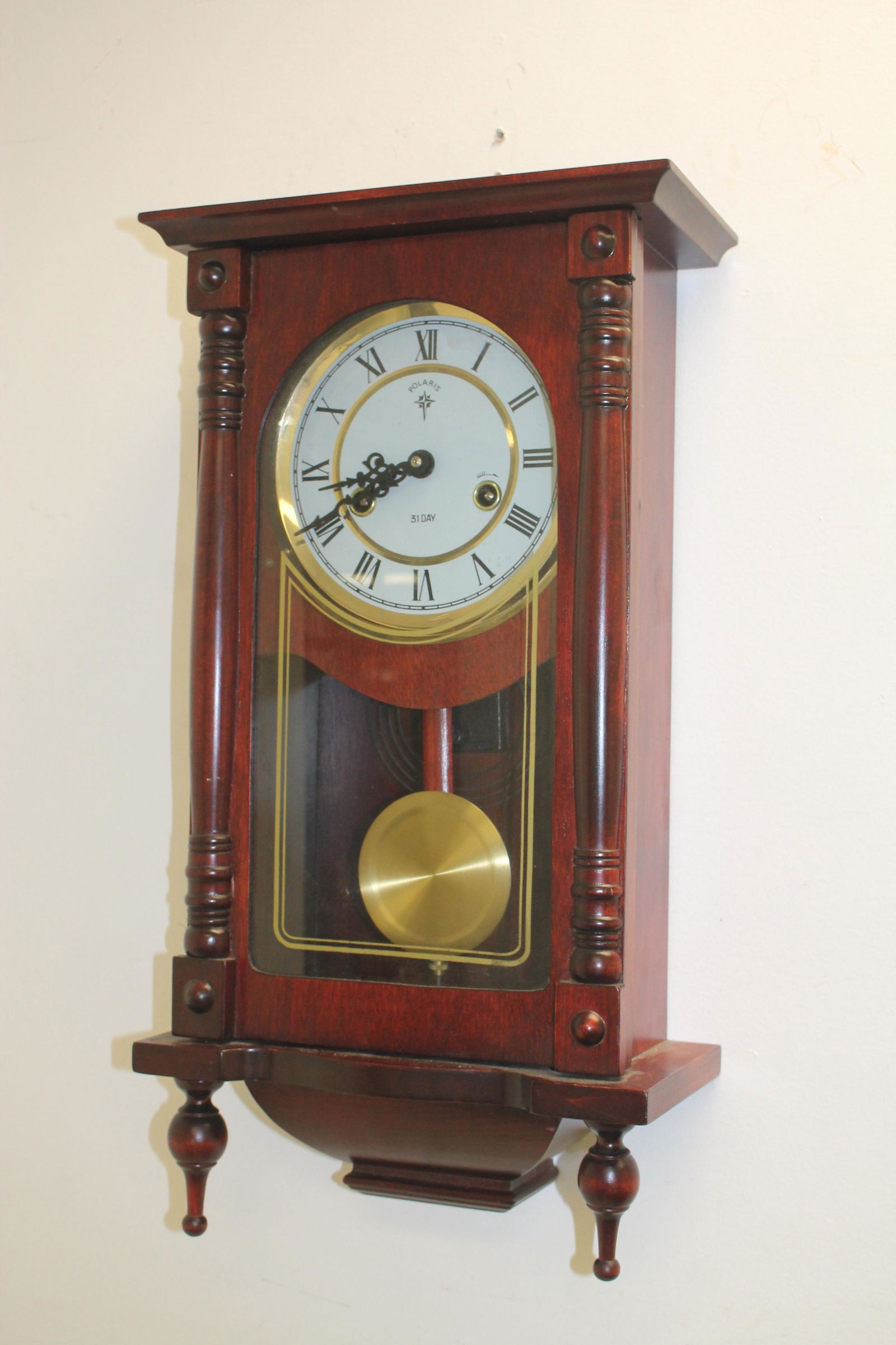 Polaris 31 day wall clock - 21 1/2" tall x 11 1/2" wide (1 of 2)