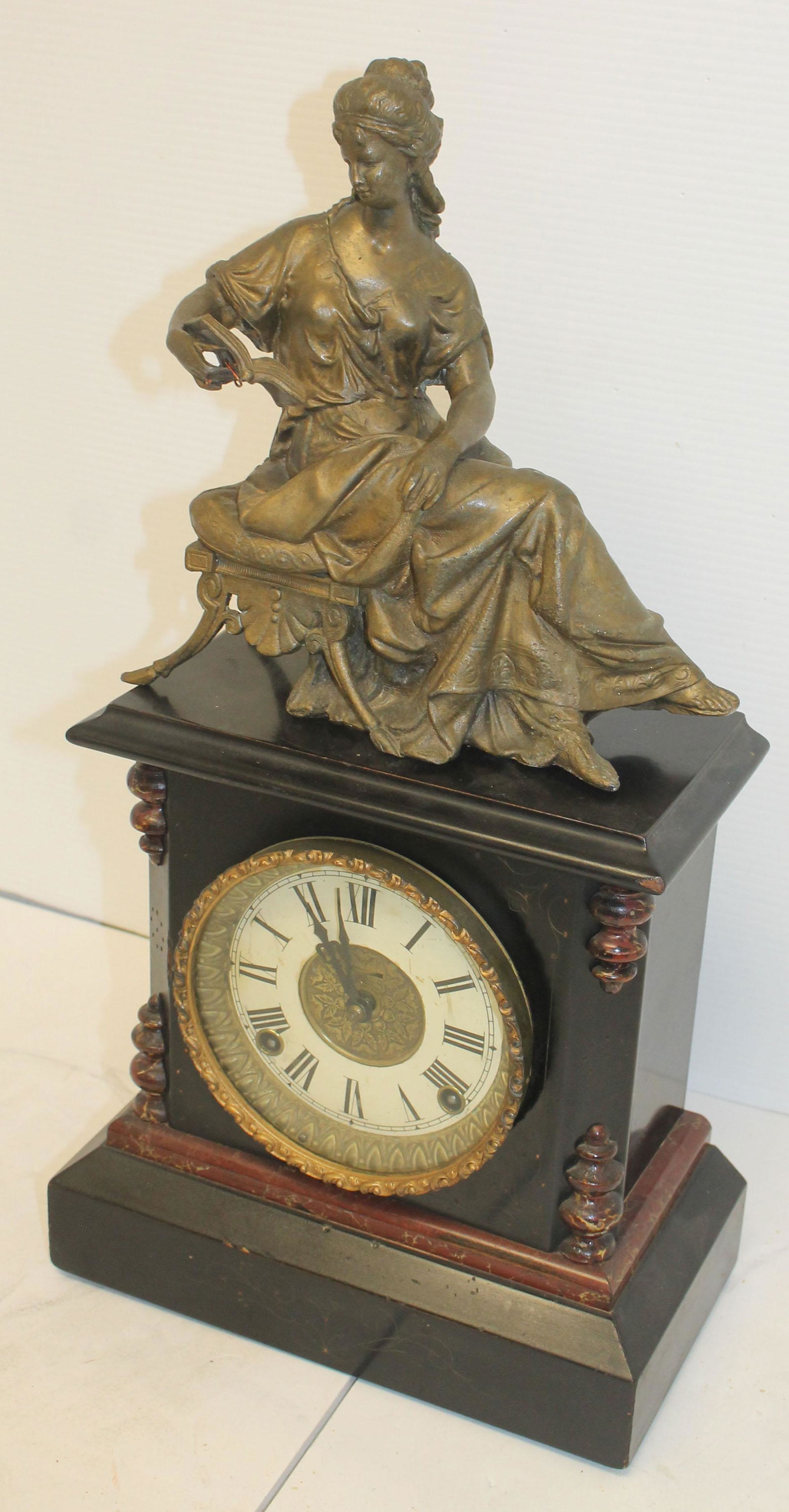 Ingraham 8 day wooden mantle clock w figural woman atop (1 of 8)