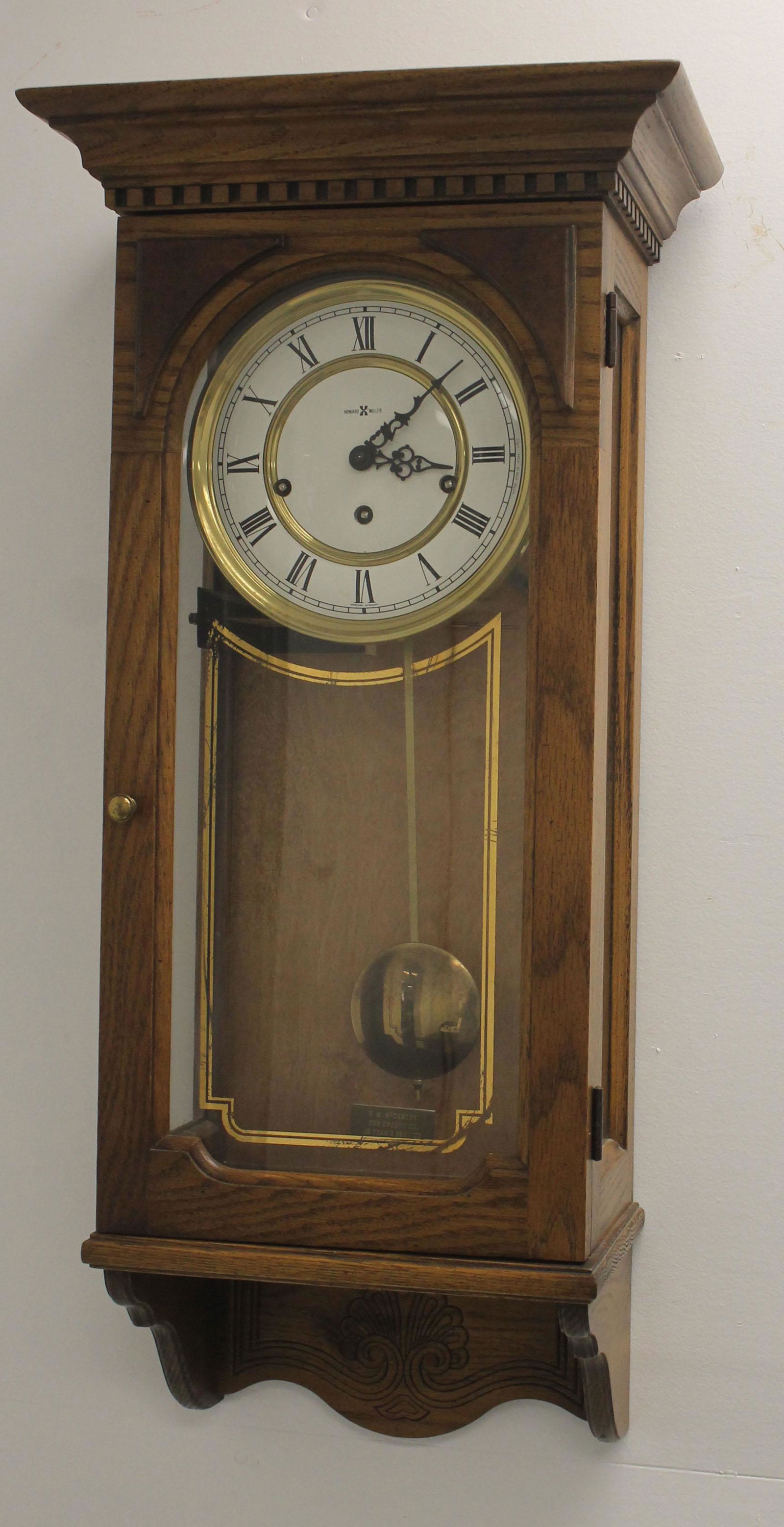 Howard Miller German oak wall clock - 29 1/2" x 14 1/2" (1 of 5)