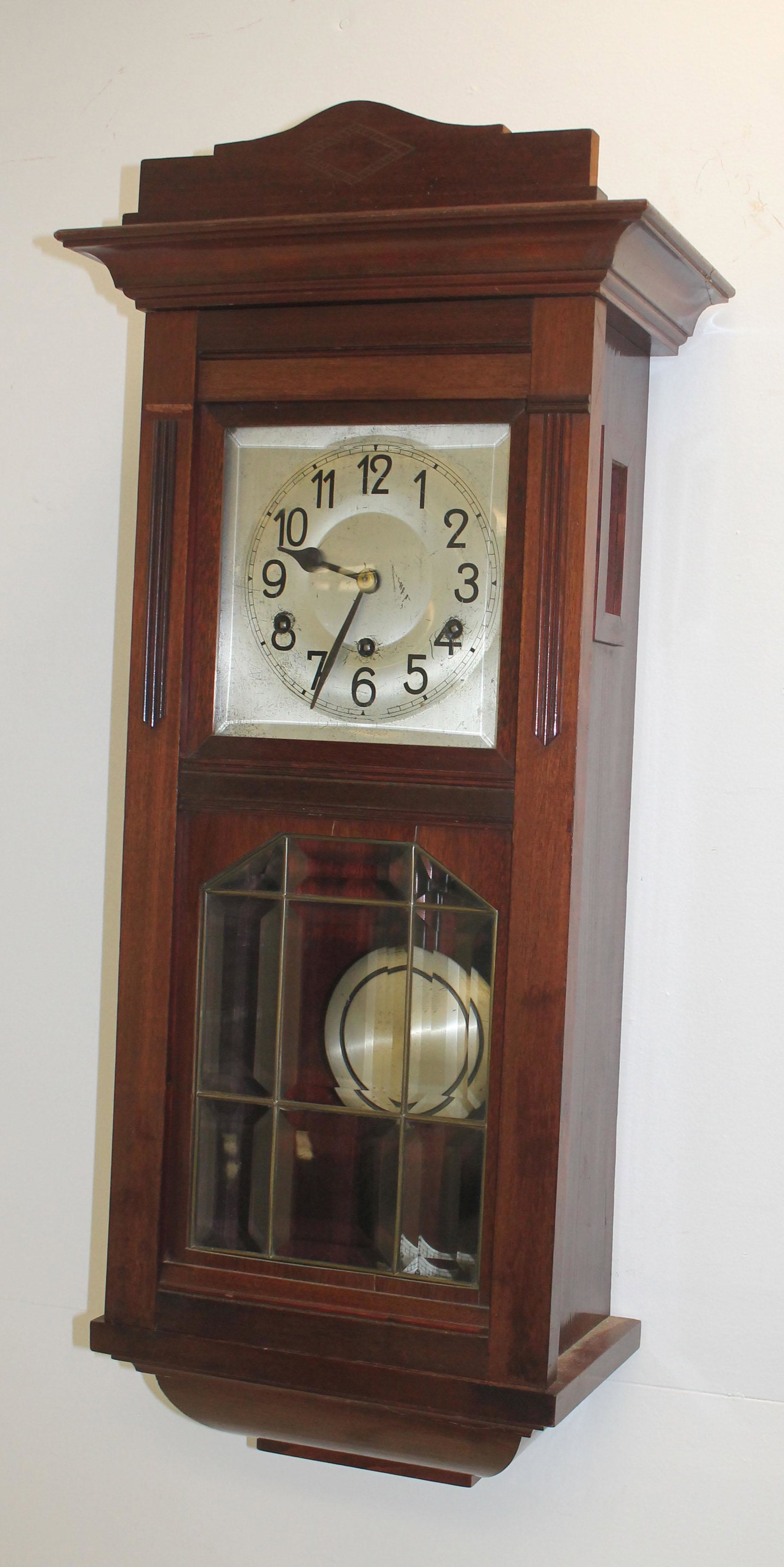Mahogany wall clock w beveled glass door - 31"x1014": Mahogany wall clock w beveled glass door - 31"x1014"