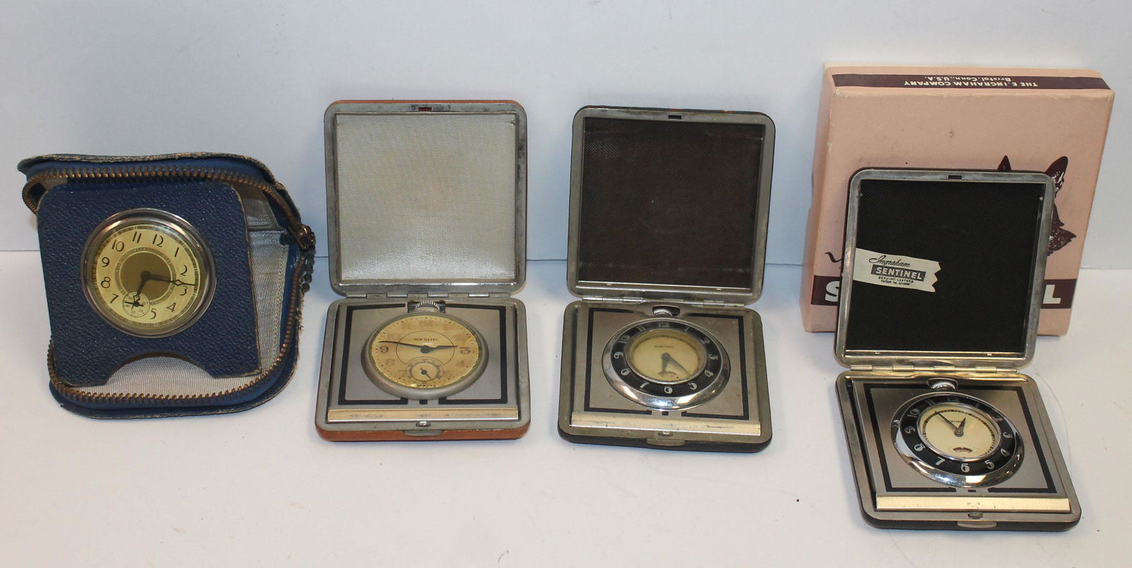 4 travel pocket watch alarm clocks in cases by Ingraham (1 of 8)