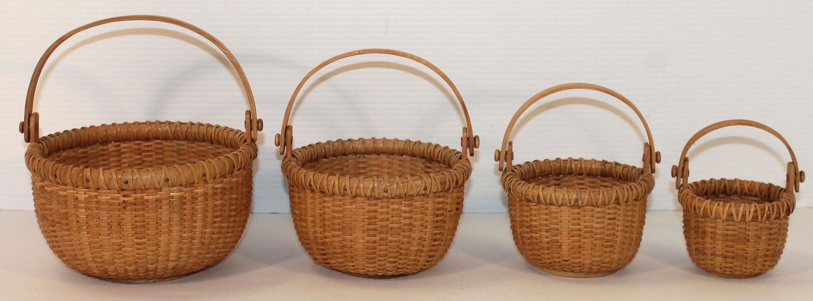 Nest of 4 contemporary swing handled open Nantucket (1 of 5)