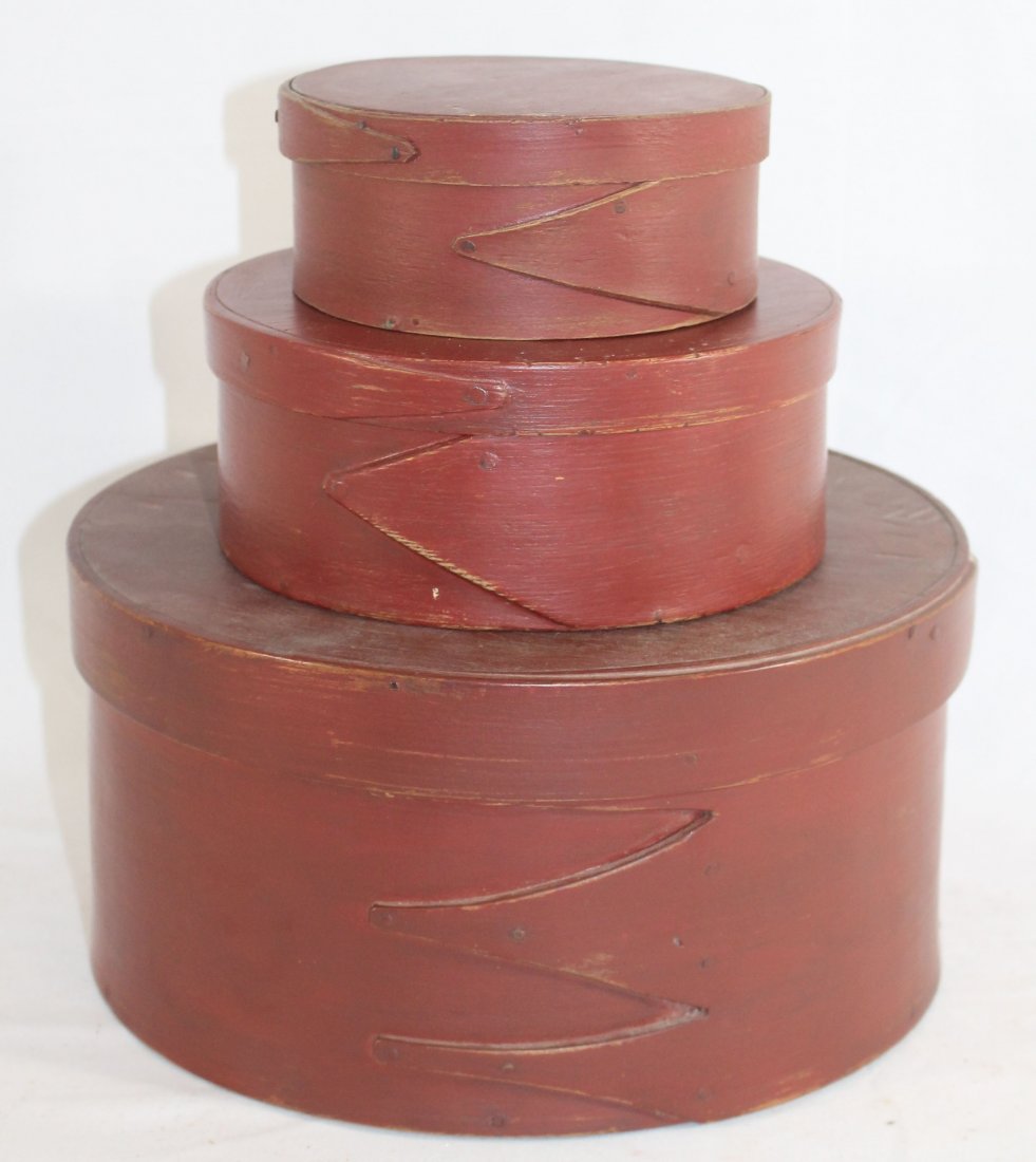 lot of 5 round pantry boxes - as found - 4 in red & 1: lot of 5 round pantry boxes - as found - 4 in red & 1 green - largest is 10 1/4" diam - smallest is 5 1/4" diam