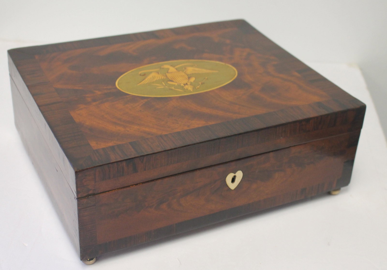 Antique inlaid document/dresser box w heart shaped bone: Antique inlaid document/dresser box w heart shaped bone escutcheon on brass ball feet - 10"x12"x4 1/2"