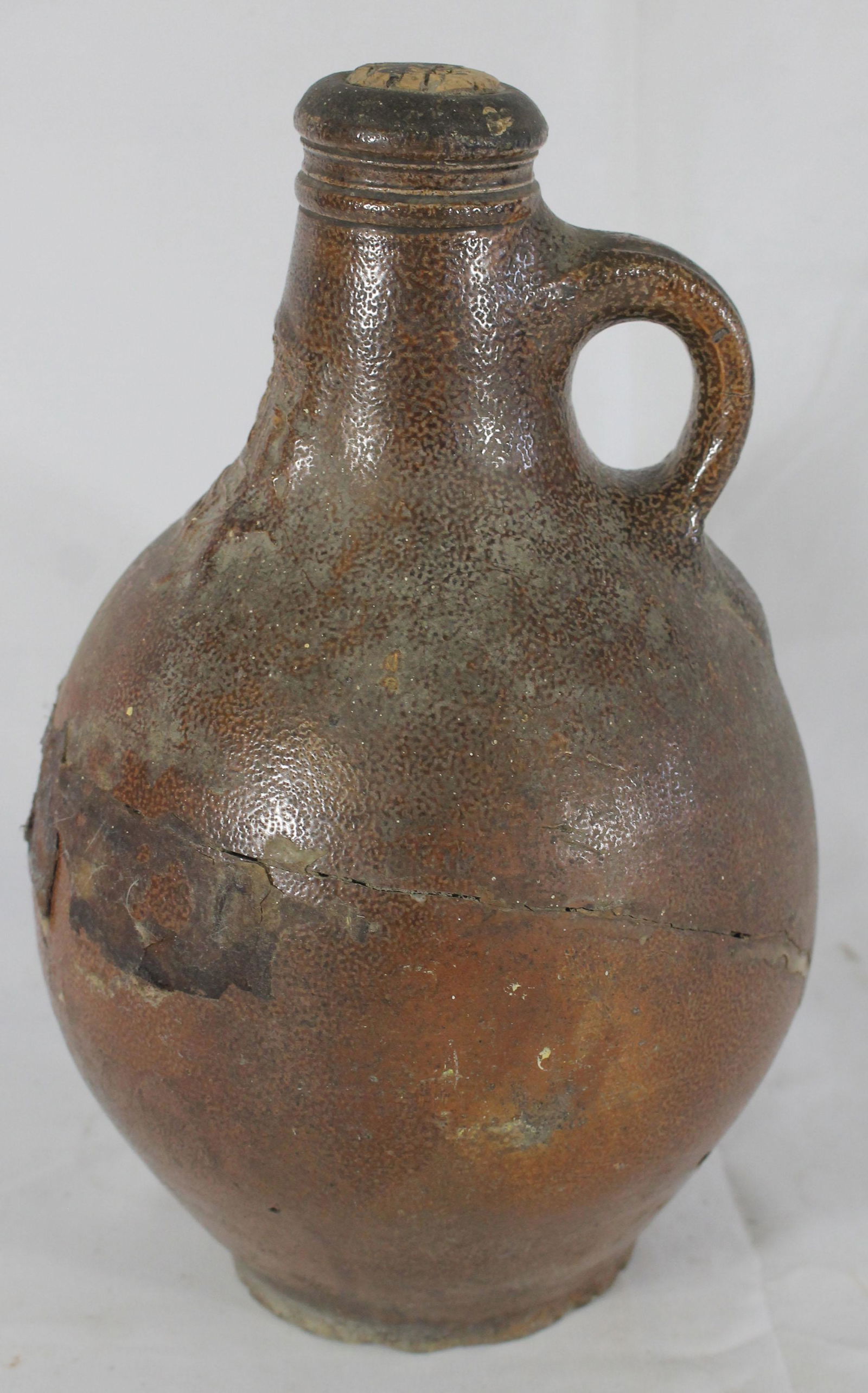Antique Bellarmine stoneware jug - as found with crack (1 of 8)