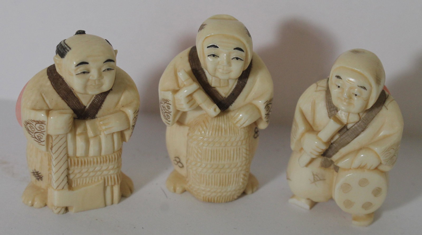 3 Japanese carved netsukes of scholars - approx 1 3/4": 3 Japanese carved netsukes of scholars - approx 1 3/4"