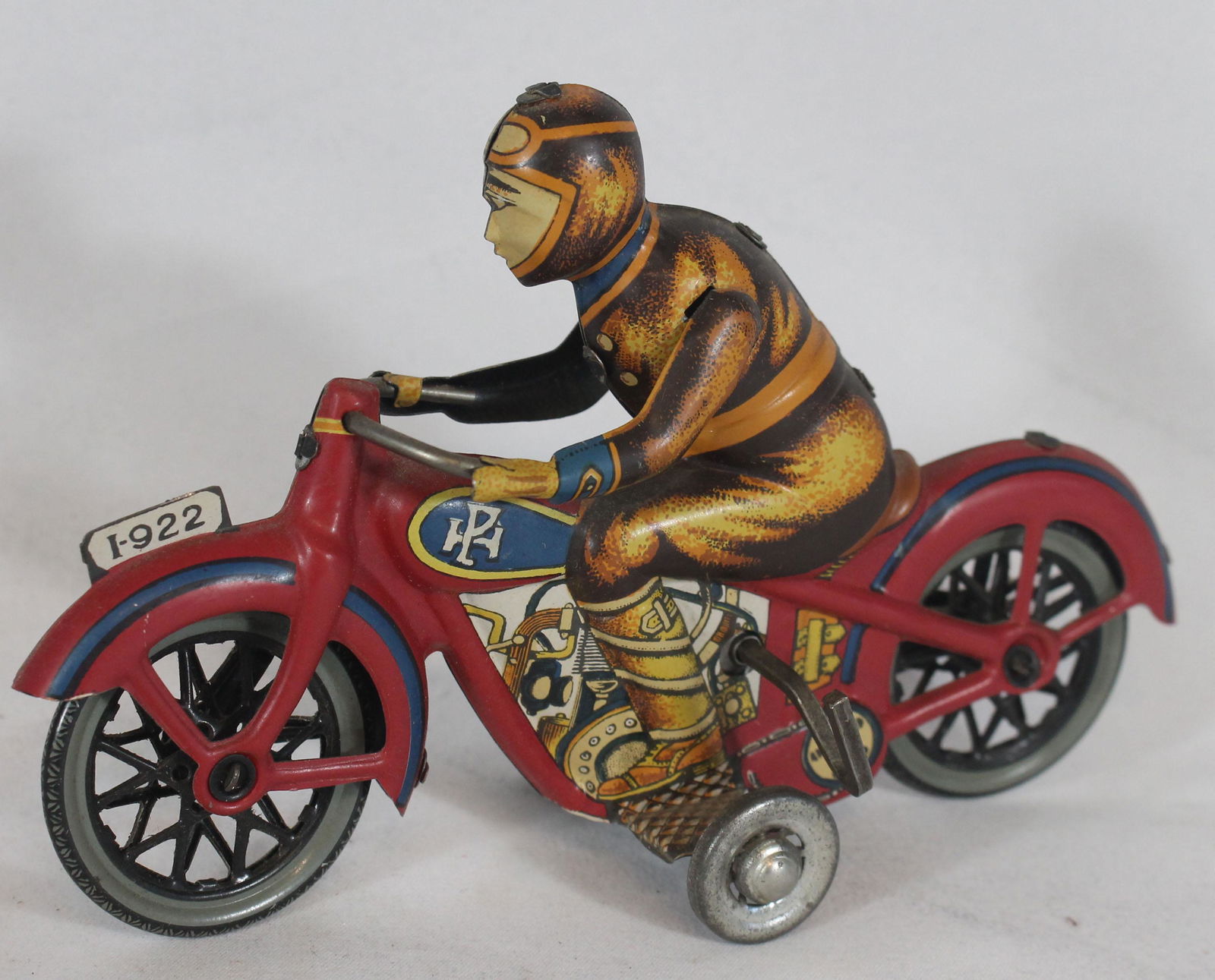 Tin wind-up motorcycle w rider - 6 1/2" long (1 of 4)