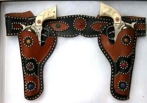 "Cowboy" Western toy gun & holster set w fancy jew: "Cowboy" Western toy gun & holster set w fancy jeweled holsters - by Hubley