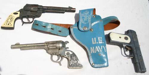 3 toy guns - Western US Marsall in holster, Wester: 3 toy guns - Western US Marsall in holster, Western Buckin' Bronc Marshall & an Army 45