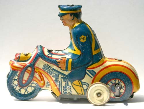 Marx tin wind up motor cycle cop - 4 1/2" long: Marx tin wind up motor cycle cop - 4 1/2" long