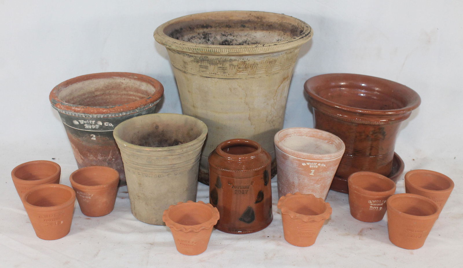 Large lot of Guy Wolff terra cotta planters/pots in (1 of 8)