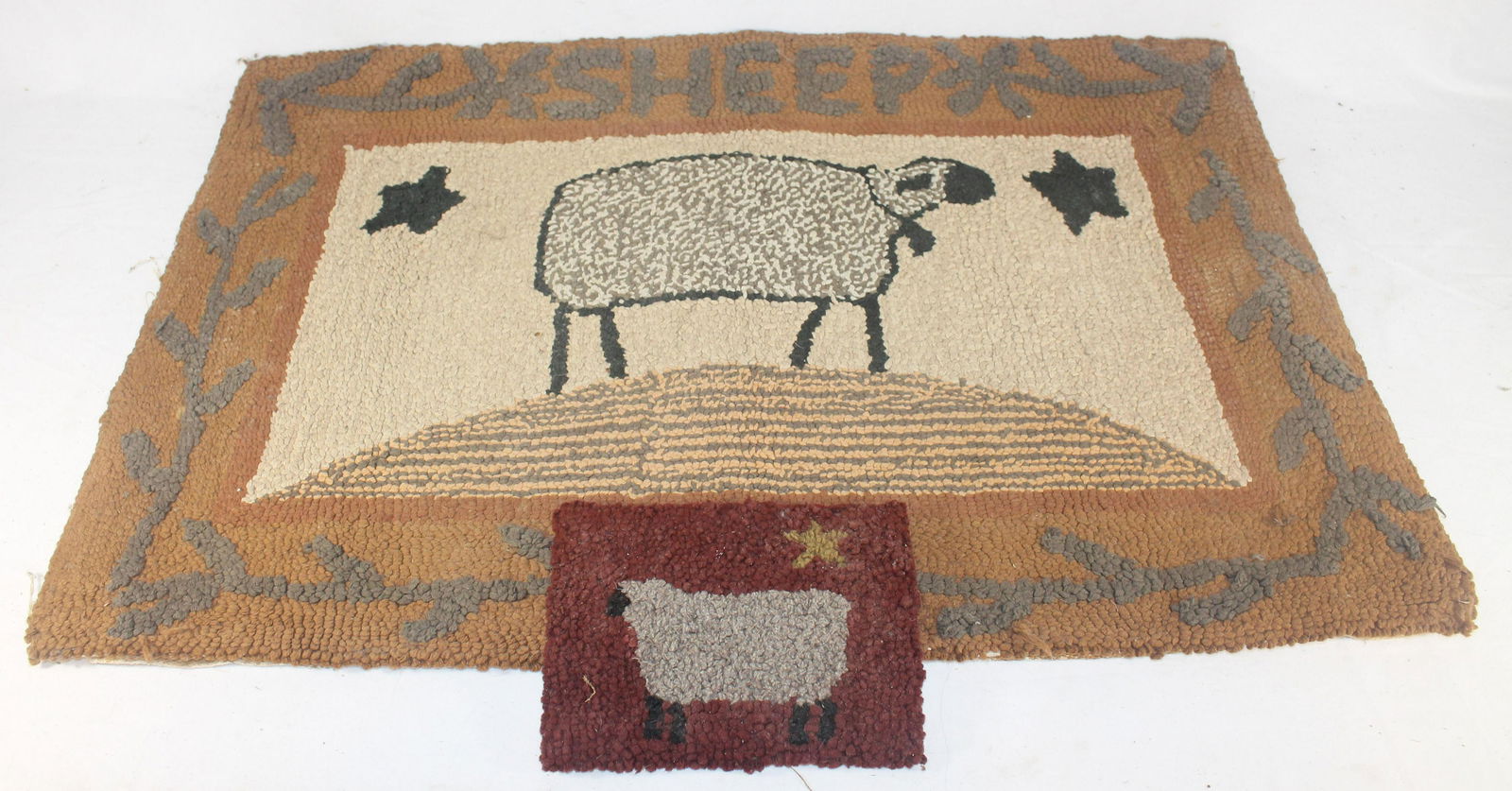 2 hooked rugs w sheep motif incl 1 very small table mat (1 of 12)