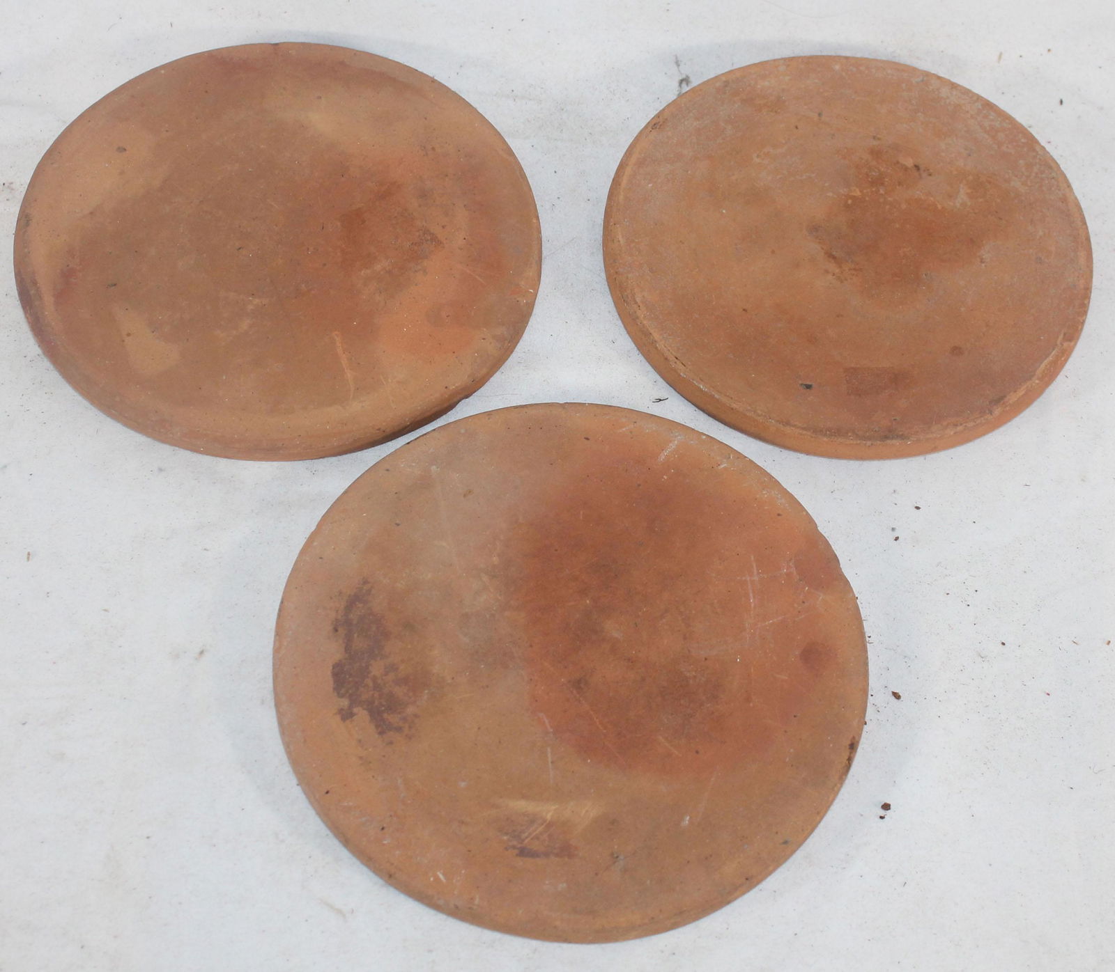 lot of 3 antique redware trivets or crock lids - approx (1 of 8)
