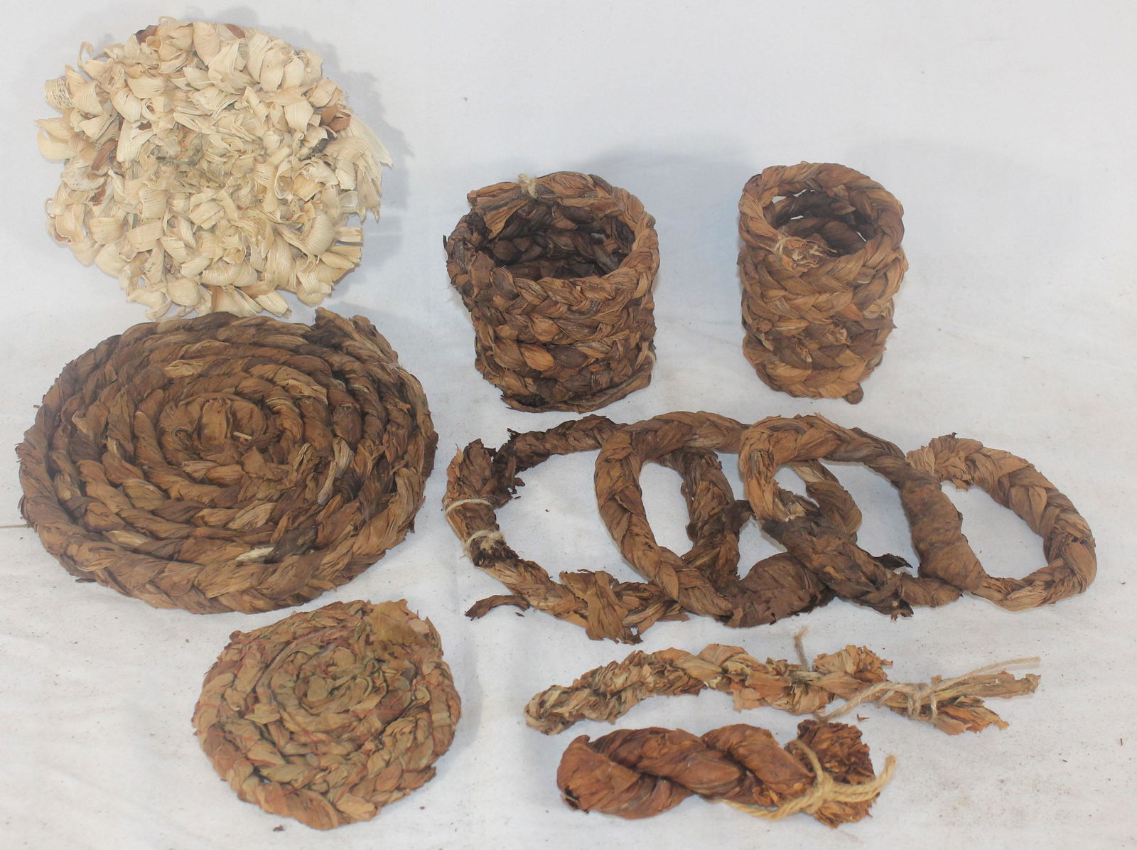Collection of tobacco items incl braided, mats, twists (1 of 9)
