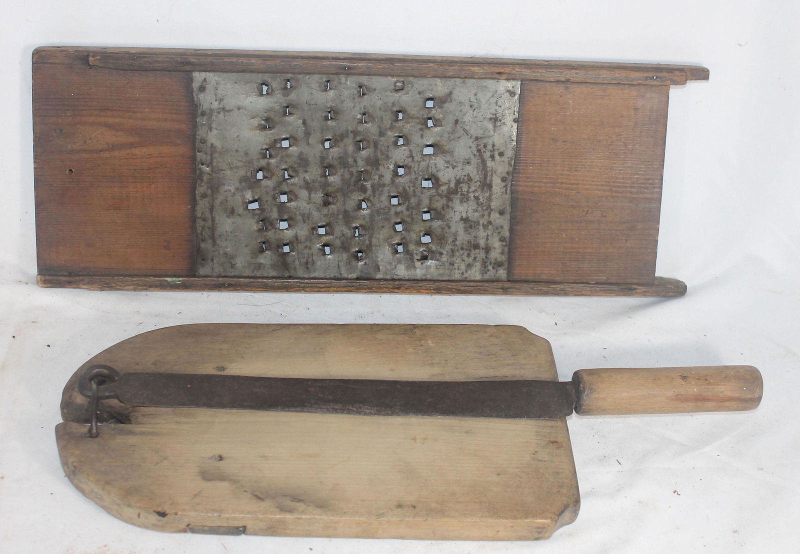Primitive utensil lot incl large grater & chopper w: Primitive utensil lot incl large grater & chopper w attached knife - grater is 19 1/2" x 7" & chopper is 18 1/2" incl knife x 7 1/4"