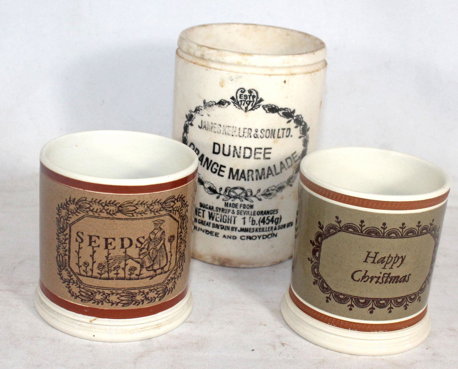 2 transferware motto cups by Don Carpentier together w: 3 transferware motto cups by Don Carpentier together w a Dundee Orange Marmalade jar