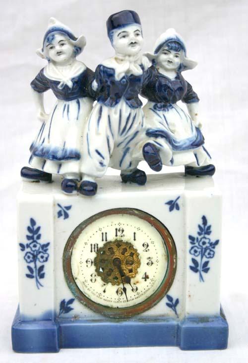 early 20thC Delft style blue & white figural clock: early 20thC Delft style blue & white figural clock by New Haven Clock Co