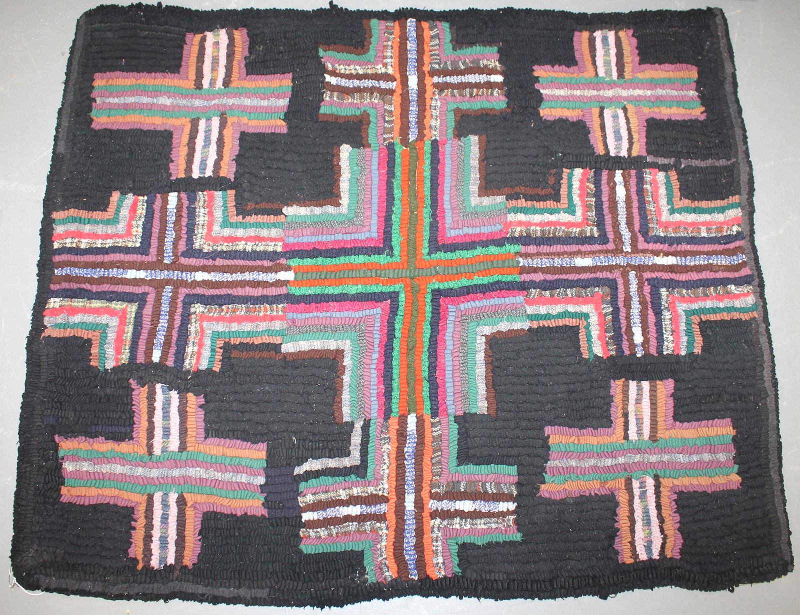 Antique hooked rug with colorful crosses dec on black (1 of 3)